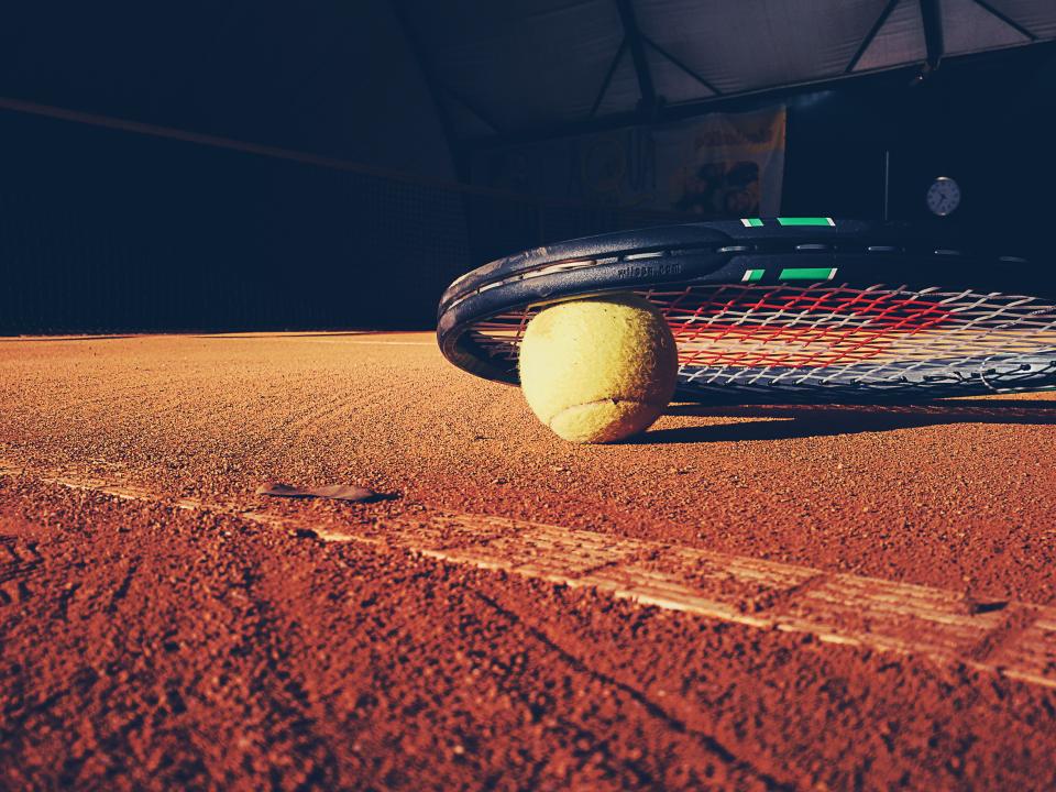 Tennis Elbow: How to Keep Practising With a Ball Machine